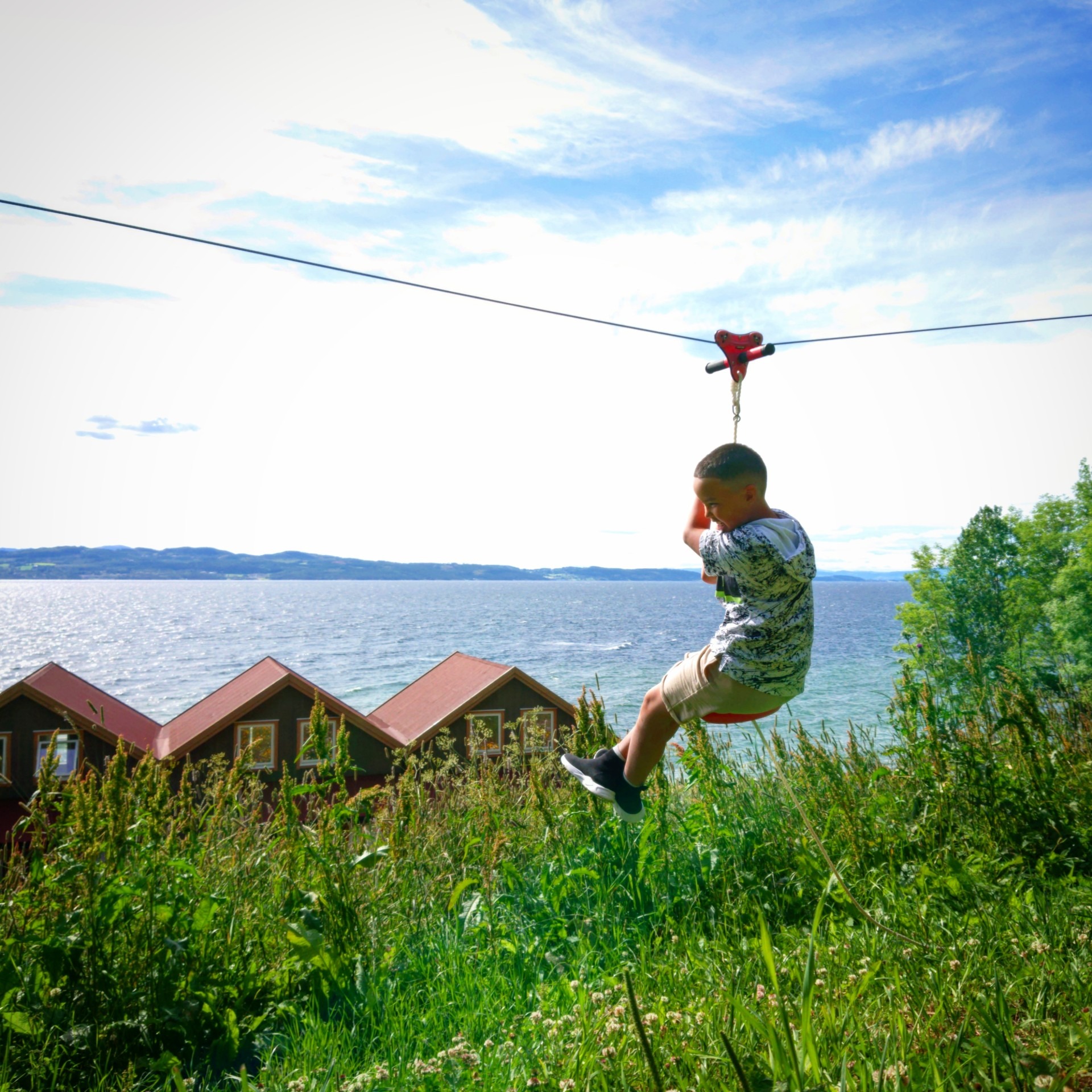 Edward tests out the zip line at Hjellup Fjordbo
